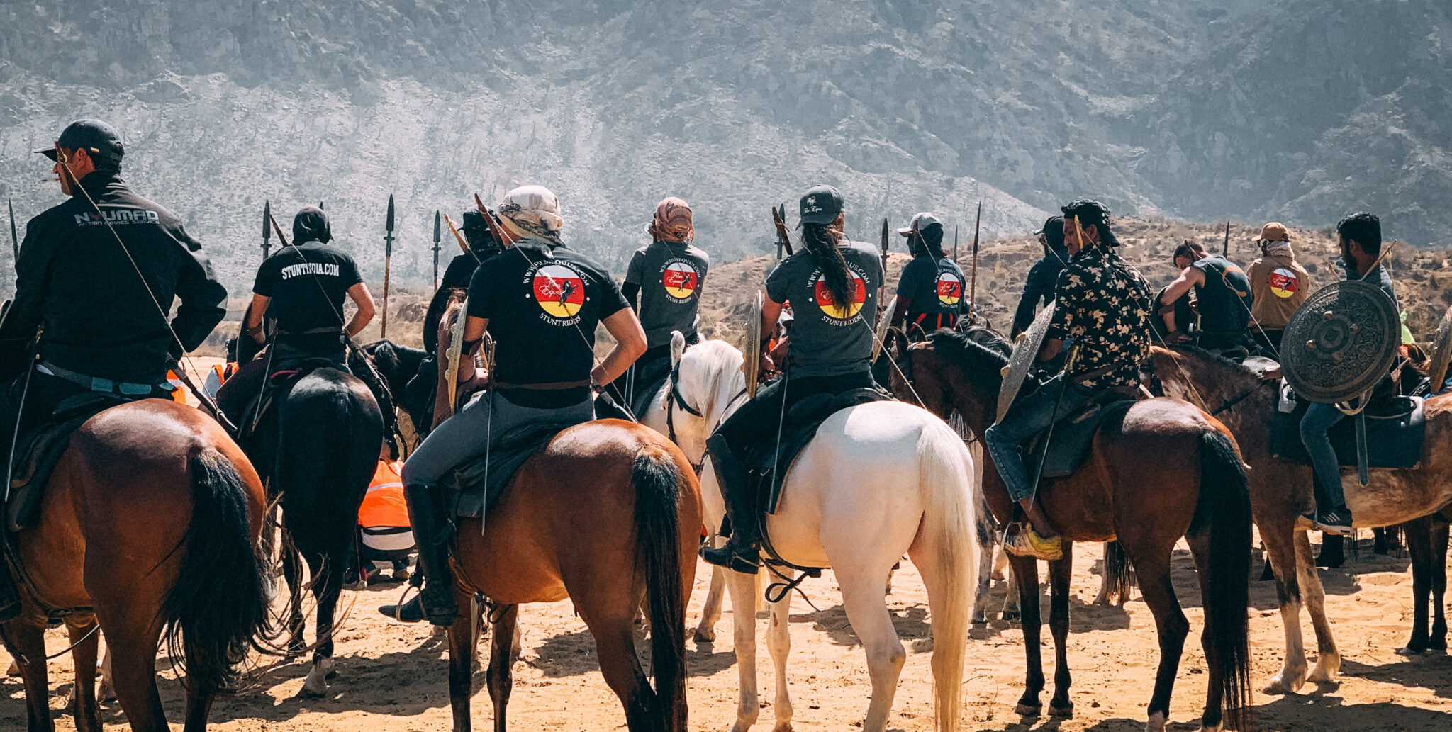 Film Equus stunt crew on horses practicing for a movie scene in India