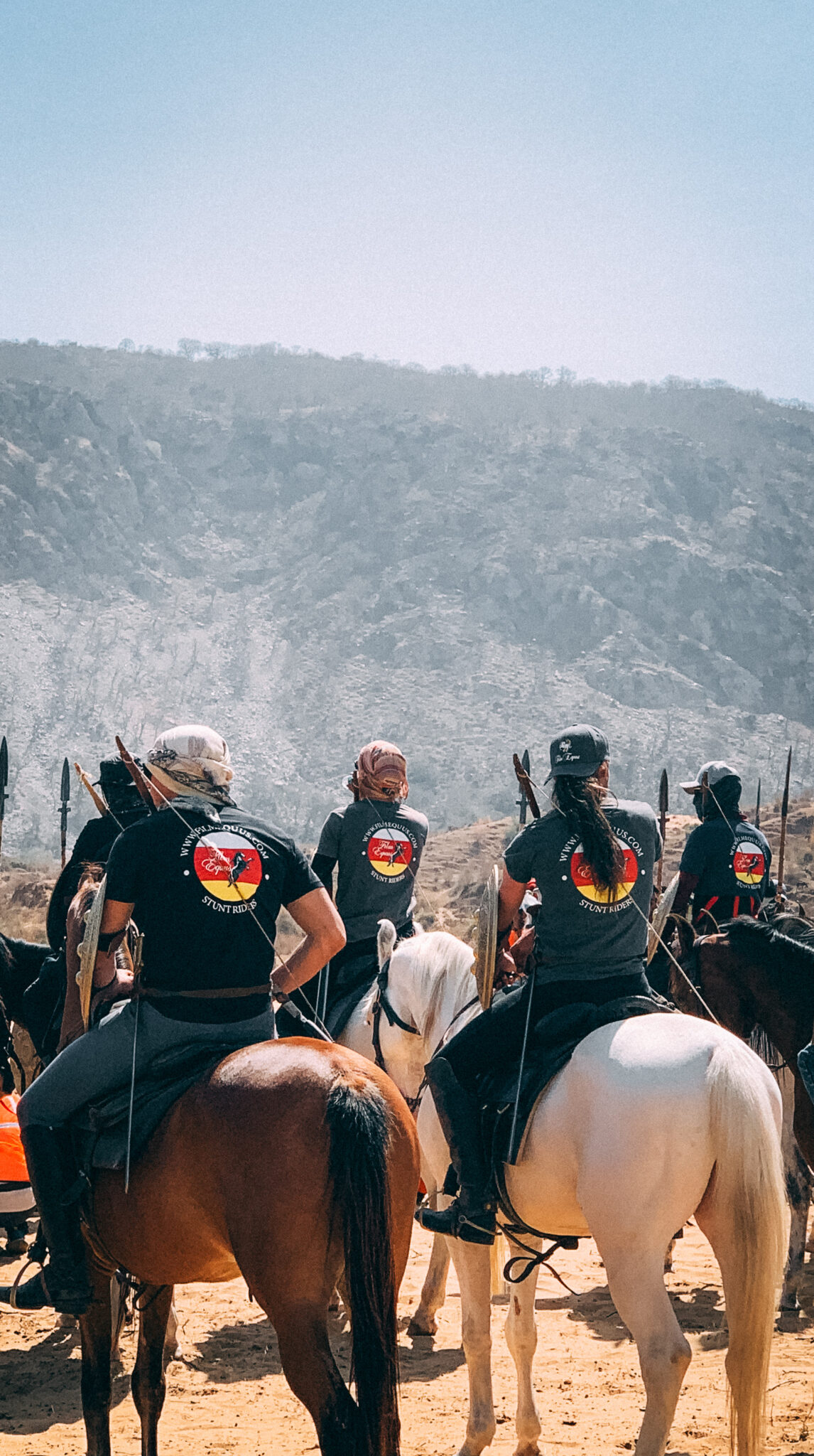 Film Equus stunt crew on horses practicing for a movie scene in India