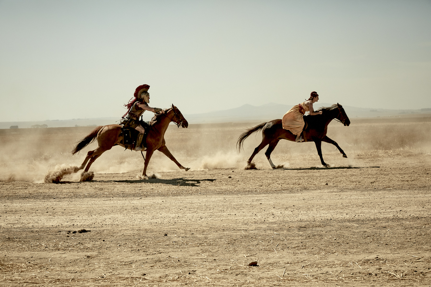 Stunt riders on galloping horses from a PMU commercial